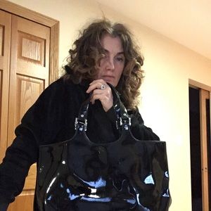 Beautiful,functional,in perfect condition black patent leather tote.